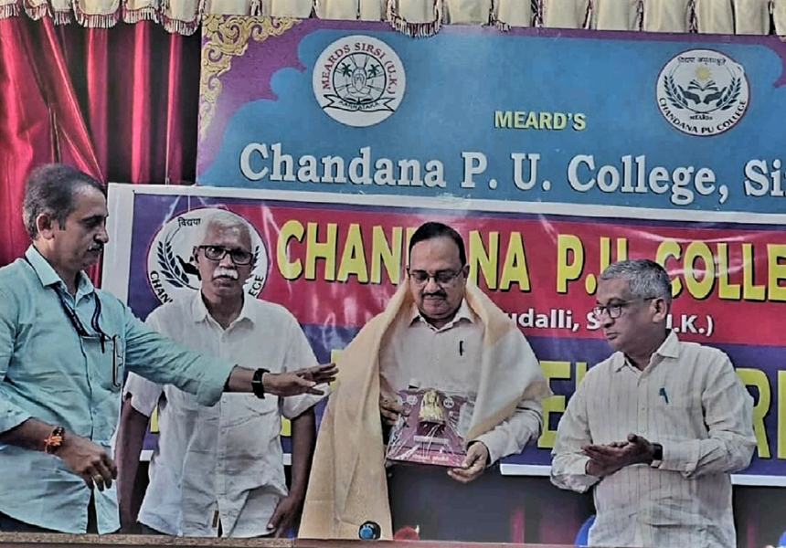 Dr Hegde being felicitated with a shawl and memento at Chandana P.U. College
