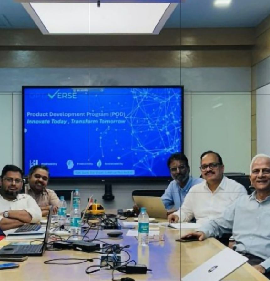 Dr Hegde with an industry team around a conference table; the screen reads Product Development Program, Innovate Today, Transform Tomorrow